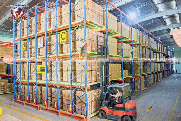 Modern warehouse with high racking and forklifts